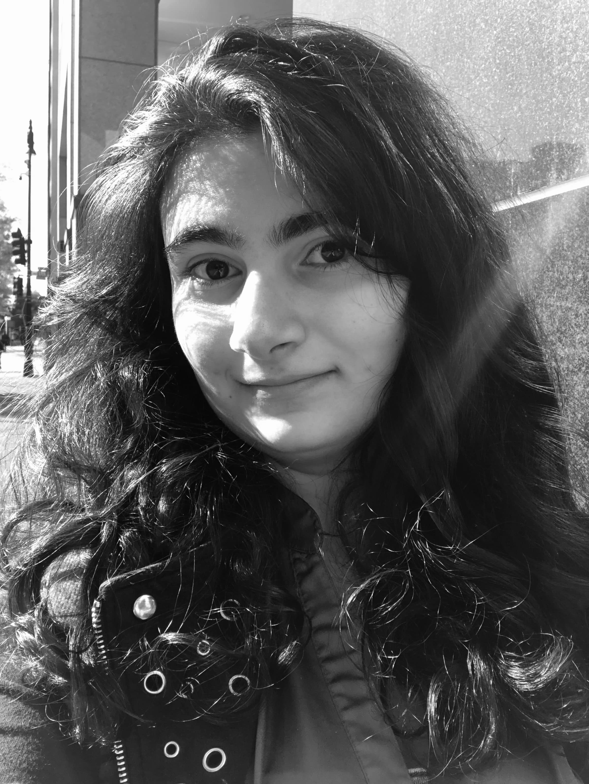 Sophia Alexanian Black-and-White Portrait - girl with wavy dark hair